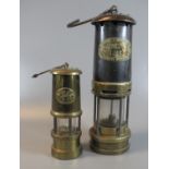 Thomas & Williams of Aberdare brass miner's safety lamp in used condition, together with a