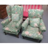 Two early 20th Century armchairs, one of wing form, upholstered with exotic birds amongst