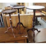 Victorian style mahogany tripod lamp table or circular form, together with two reproduction tripod