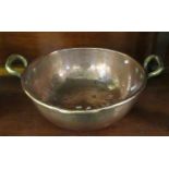 19th Century beaten copper two handled pot with brass handles. (B.P. 21% + VAT)