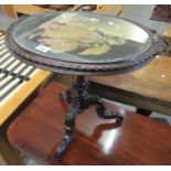 19th Century stained walnut tripod glass top tapestry decorated table of oval form. (B.P. 21% + VAT)