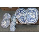 Box of blue and white 'Willow' pattern china to include: dinner plates, three oval meat dishes and