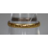 Platinum and gold engraved wedding ring. Ring size L. Approx weight 2.2 grams. (B.P. 21% + VAT)