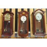 Three modern wall clocks to include; an Edwardian style marked 'London Clock Company', an Emperor