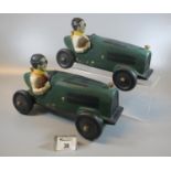 Two similar modern ceramic models of vintage racing cars. 32cm long approx.