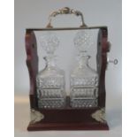 Modern two section tantalus with metal mounts and two moulded glass square section decanters and