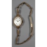 9ct gold rotary ladies gold wrist watch with an oval face. (B.P. 21% + VAT)