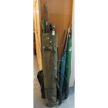 Collection of fishing equipment to include various vintage and other rods, landing nets, parasols,