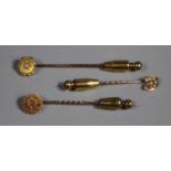 Two pearl set stick pins and a red stone stick pin. (B.P. 21% + VAT)