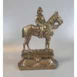 Brass flat backed door stop in the form of an equestrian figure, marked Lord Kitchener. (B.P.