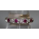 9ct gold ruby and diamond half eternity style ring. Ring size P. Approx weight 2.5 grams. (B.P.