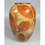 Royal Doulton stoneware vase of ovoid form decorated with autumn leaves, impressed marks to the