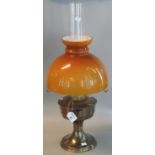 Mid Century oil lamp having clear glass chimney, opaline glass brown mushroom shade on a brass base.