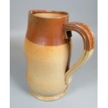 Doulton Lambeth two tone stoneware 'Blackjack' jug. 19cm high approx, impressed marks to the base,