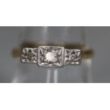 18ct gold platinum mounted three stone diamond ring. Ring size O. Approx weight 2.9 grams. (B.P. 21%