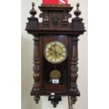 Early 20th Century Vienna type walnut two train wall clock, with key and pendulum. (B.P. 21% + VAT)