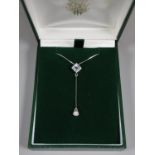 Platinum aquamarine and diamond negligee style pendant. Approx weight 3.2 grams. (B.P. 21% + VAT)