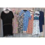 Seven vintage and vintage style dresses to include; a lace long sleeve dress (missing underslip),
