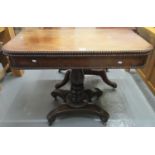 19th Century mahogany tea table on a quatreform base with moulded and fluted decoration on cups