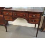 19th century mahogany desk, the moulded top above an arrangement of five drawers, standing on square