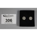 Pair of diamond cluster earrings. (B.P. 21% + VAT)