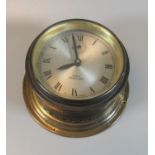Brass bulkhead Ships type clock, the silvered Roman face marked "Celeste Yacht alarm". Worn