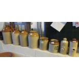 Collection of stoneware items to include flagons, one marked Knowles Chesterfield, utensil jars,