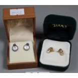 Two pairs of earrings, one commemorating The Ryder Cup. (2) (B.P. 21% + VAT)