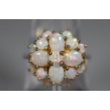 9ct gold opal cluster ring. Ring size N&1/2. Approx weight 4.2 grams. (B.P. 21% + VAT)