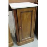 Victorian mahogany single door blind panel marble top pot cupboard on a platform base. (B.P. 21% +