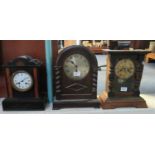Late Victorian black slate and marble two train architectural mantel clock with white enameled Roman