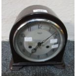 Smith's mid century bakelite two train arch topped mantel clock with silvered Arabic dial. 21cm high