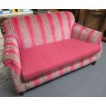 Modern multi-coloured two seater sofa with scroll arms. (B.P. 21% + VAT)