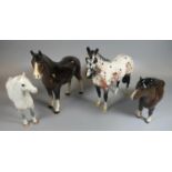 Collection of three Beswick china horses, together with another similar china horse. (4) (B.P. 21% +