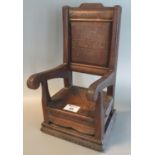 Miniature oak Eisteddfod type chair marked 'CRUGYBAR', dated 1956. 33cm high approx. (B.P. 21% +