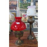 Early 20th century double oil burner lamp with opaline glass floral shade, together with another mid