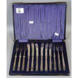 Cased set of six silver handled knives and forks set with steel blades. (B.P. 21% + VAT)