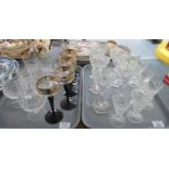 Two trays of, mainly, cut glass to include: five cut glass wine glasses with hexagonal feet, six cut