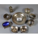 Bag of assorted silver to include; pin dish, napkin rings including an Indian white metal napkin