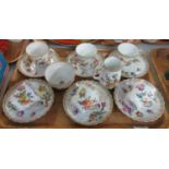 Dresden porcelain part tea service on a white ground with floral sprays, to include six cups and