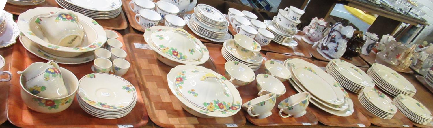 Six trays of Royal Doulton 'Minden' dinner ware with stylised pastel coloured flowers on a cream