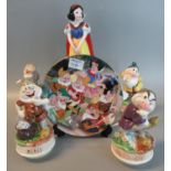 Four Schmid ceramic musical dwarves to include; 'Doc', 'Sneezy', 'Bashful' and 'Grumpy', together