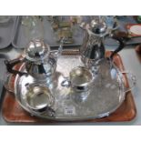 Four-piece silver plated tea set, together with a two-handles pierced and engraved tray. (B.P. 21% +