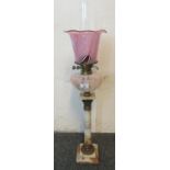 Early 20th Century double oil burner lamp having cranberry shade, pink and white opaline glass