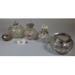Three globular silver topped scent bottles, together with another silver topped glass jar. (B.P. 21%