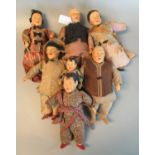 Collection of six Chinese toy figures of men, women and child, in fitted attire. (6) (B.P. 21% +