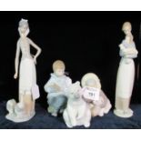 A collection of Lladro and Nao Spanish porcelain items to include; seated polar bear, Inuit with