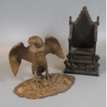 Novelty gilt metal inkwell in the form of an eagle on naturalistic base, together with a cast