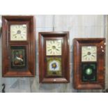 Early 20th century American Jerome & co. and Ansonia two-train wall clocks decorated with birds,