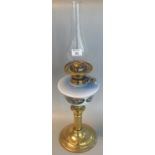 Early 20th Century double oil burner lamp having opaline glass and floral hand painted reservoir